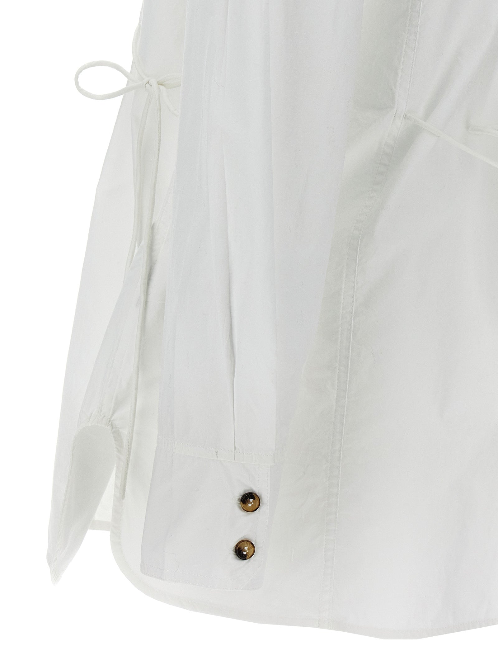 Blouse by Ganni for women in organic cotton white, featuring a nuanced and nuanced for a sophisticated finish.