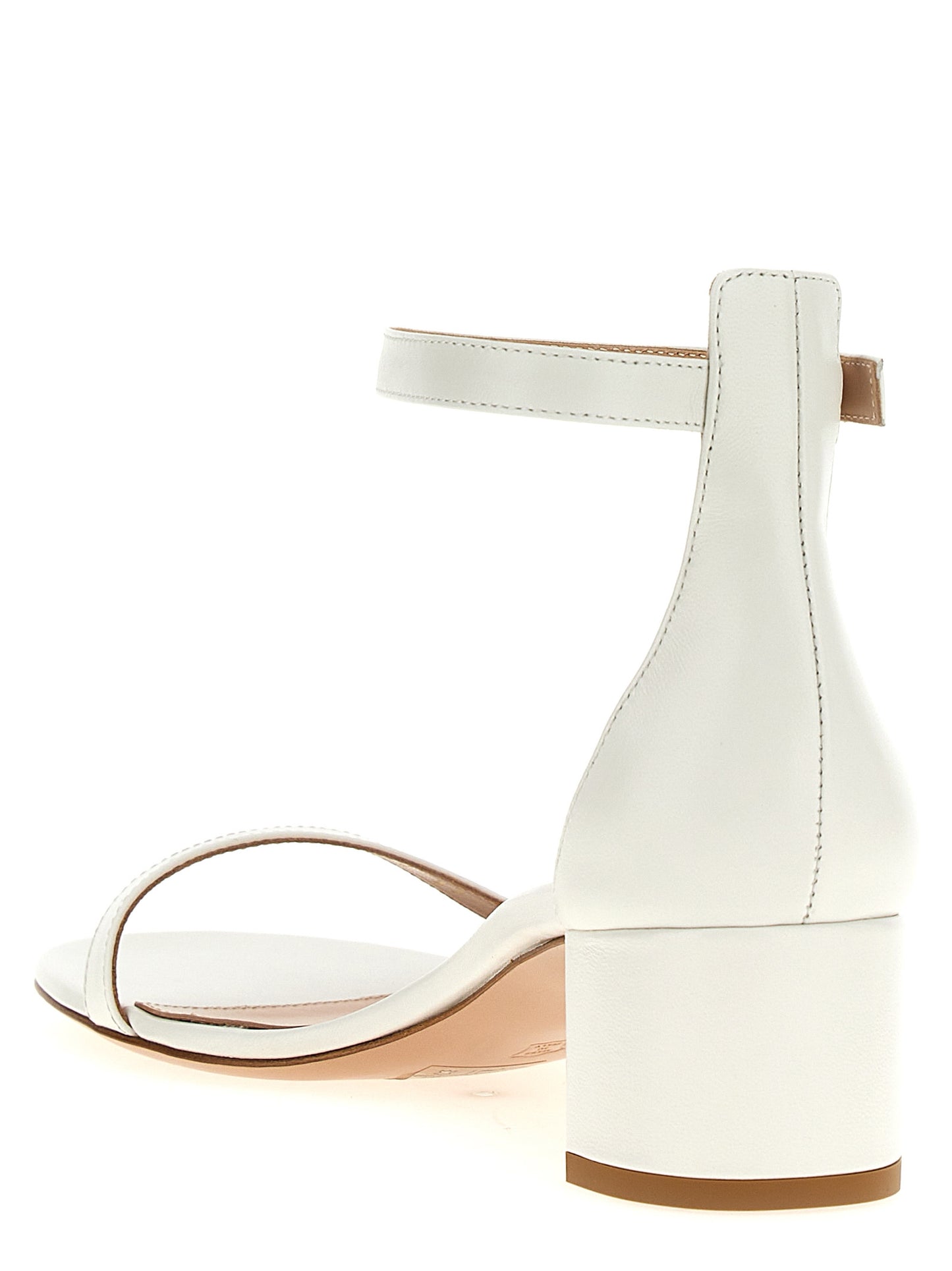 Flat Ankle Strap Sandals by Gianvito Rossi for women in leather white features an architectural design from the Women's Leather Flat Ankle Strap Sandals collection, defined by a architectural flat and for a architectural finish.