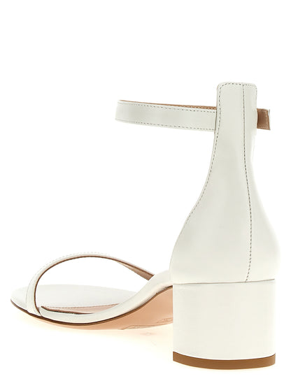 Flat Ankle Strap Sandals by Gianvito Rossi for women in leather white features an architectural design from the Women's Leather Flat Ankle Strap Sandals collection, defined by a architectural flat and for a architectural finish.