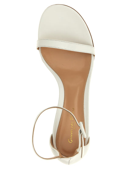 Flat Ankle Strap Sandals by Gianvito Rossi for women in leather white features an effortlessly chic silhouette from the Women's Leather Flat Ankle Strap Sandals collection, showcasing a effortlessly chic flat and elegant .