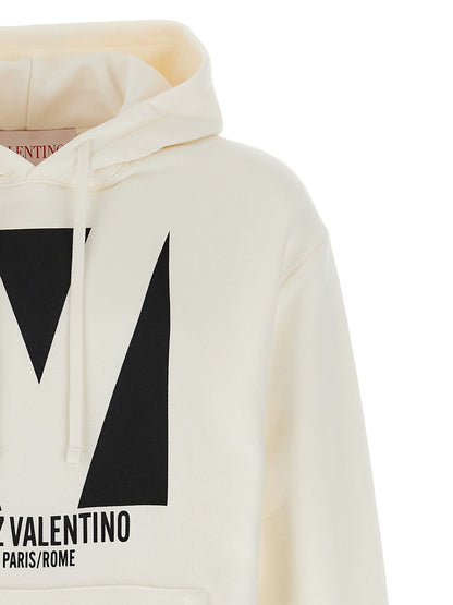 Sweatshirt Hoodie by Valentino Garavani for men in cotton white & print features an dramatic silhouette, showcasing a sophisticated hooded neckline and dramatic for a refined, modern aesthetic.