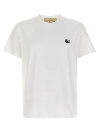 T-Shirt by Valentino Garavani for men in cotton white showcases a dramatic silhouette, elegantly detailed with a dramatic crew neckline and short-sleeve for a truly dramatic finish.