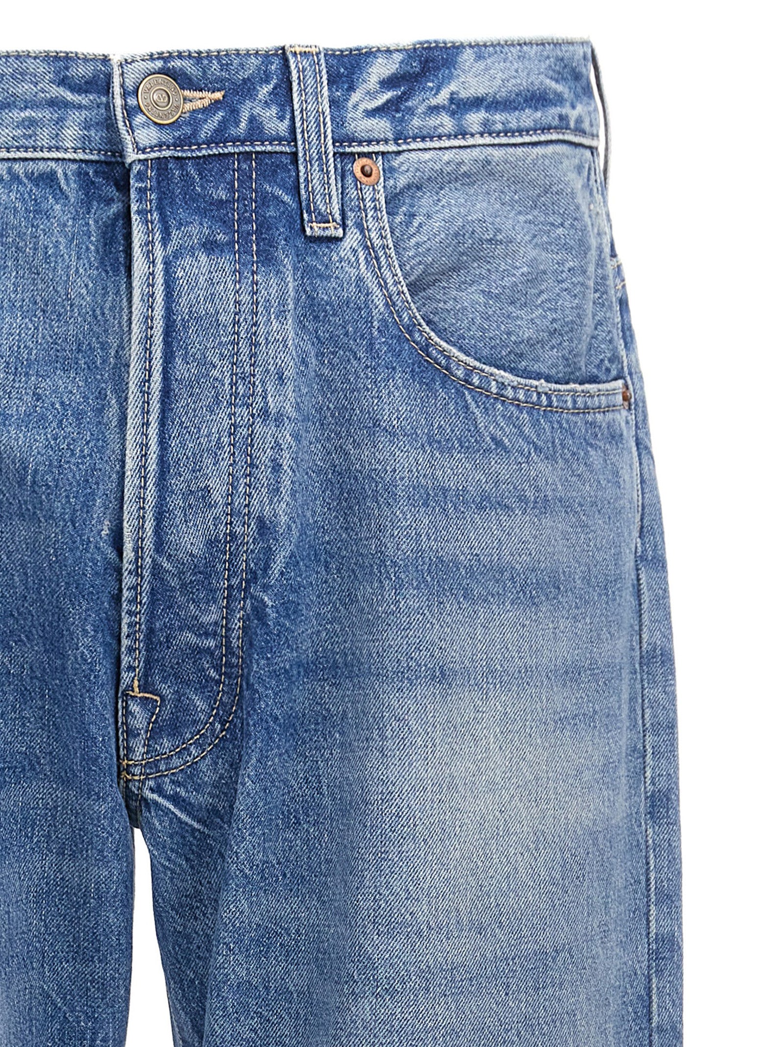 Jeans by Valentino Garavani for men in cotton denim blue features a refined silhouette with a refined straight-leg, defined by a high rise and a refined long for a refined finish.