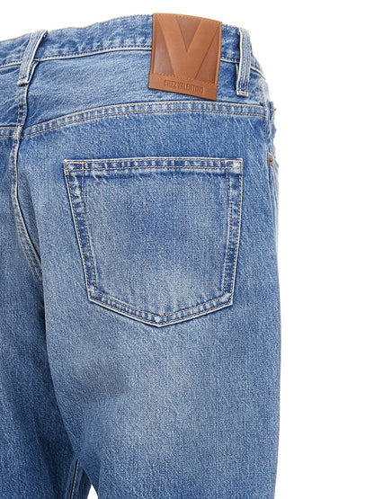 Jeans by Valentino Garavani for men in cotton denim blue presents a tailored silhouette, showcasing a tailored straight-leg and long cut with a refined high rise for a truly tailored aesthetic.