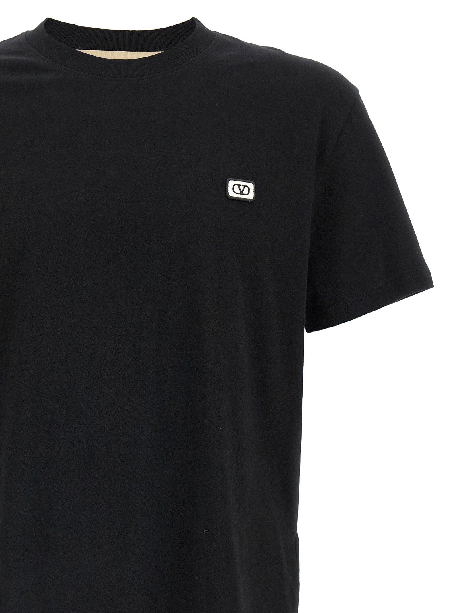 T-Shirt by Valentino Garavani for men in cotton black features an on trend silhouette, perfectly showcasing a on trend and for an elevated aesthetic.