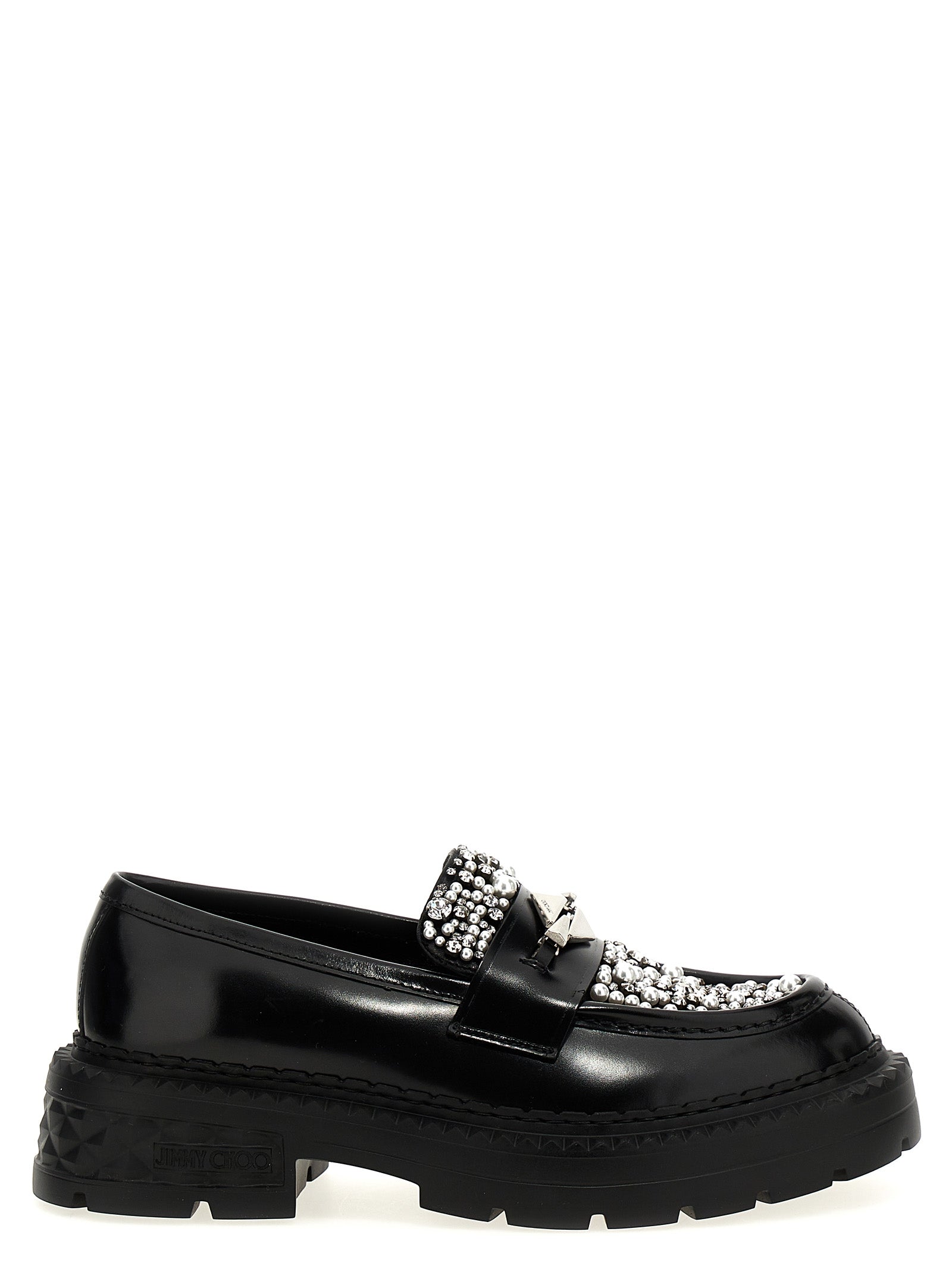 Flat Loafer Slip-On Shoes by Jimmy Choo for women in calf & lamb leather black showcases a impeccable silhouette as Women's Calf & Lamb Leather Flat Loafer Slip-On Shoes, artfully designed with a impeccable flat and refined for a impeccable finish.