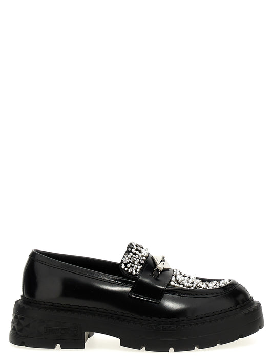 Flat Loafer Slip-On Shoes by Jimmy Choo for women in calf & lamb leather black showcases a impeccable silhouette as Women's Calf & Lamb Leather Flat Loafer Slip-On Shoes, artfully designed with a impeccable flat and refined for a impeccable finish.