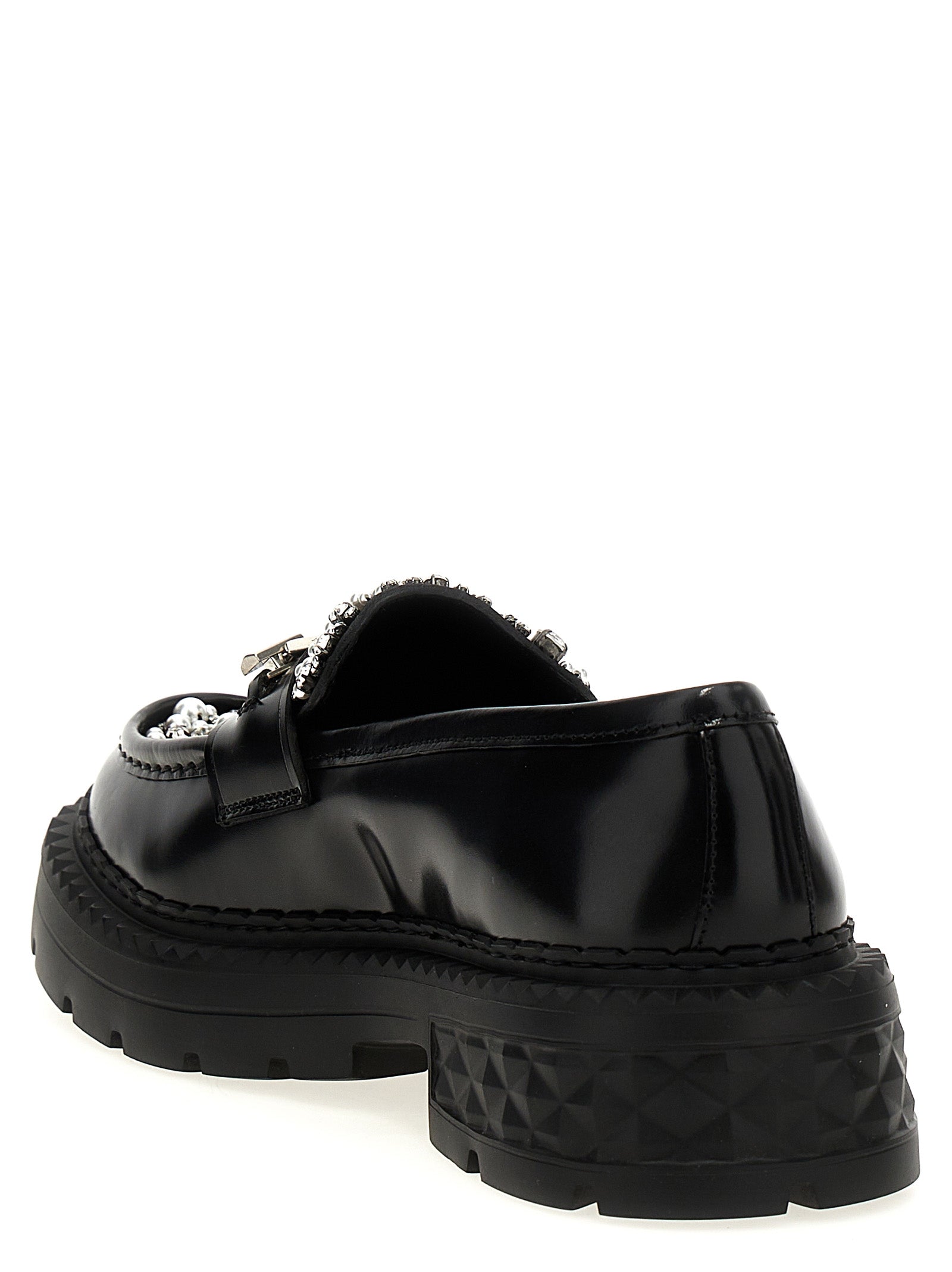 Flat Loafer Slip-On Shoes by Jimmy Choo for women in calf & lamb leather black features an dynamic silhouette from the Women's Calf & Lamb Leather Flat Loafer Slip-On Shoes collection, defined by a dynamic and flat for a dynamic look.