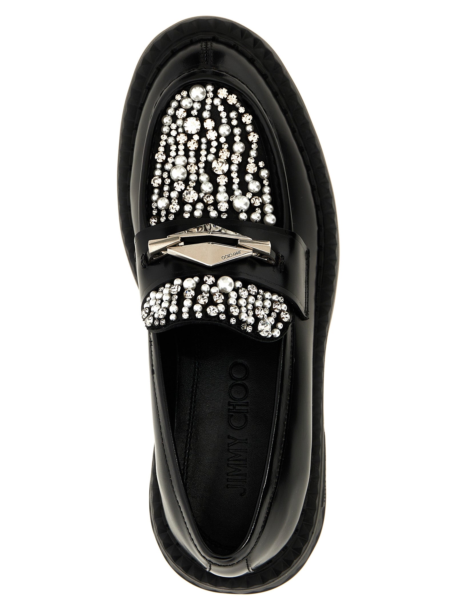 Flat Loafer Slip-On Shoes by Jimmy Choo for women in calf & lamb leather black showcases a timeless silhouette from the Women's Calf & Lamb Leather Flat Loafer Slip-On Shoes collection, featuring a timeless flat and for a timeless finish.