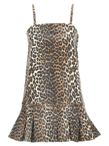 Dress by Ganni for women in stretch organic cotton denim multicolor, leopard-print & print features a dramatic silhouette, showcasing an elegant square neckline and that flows into a dramatic short mini.