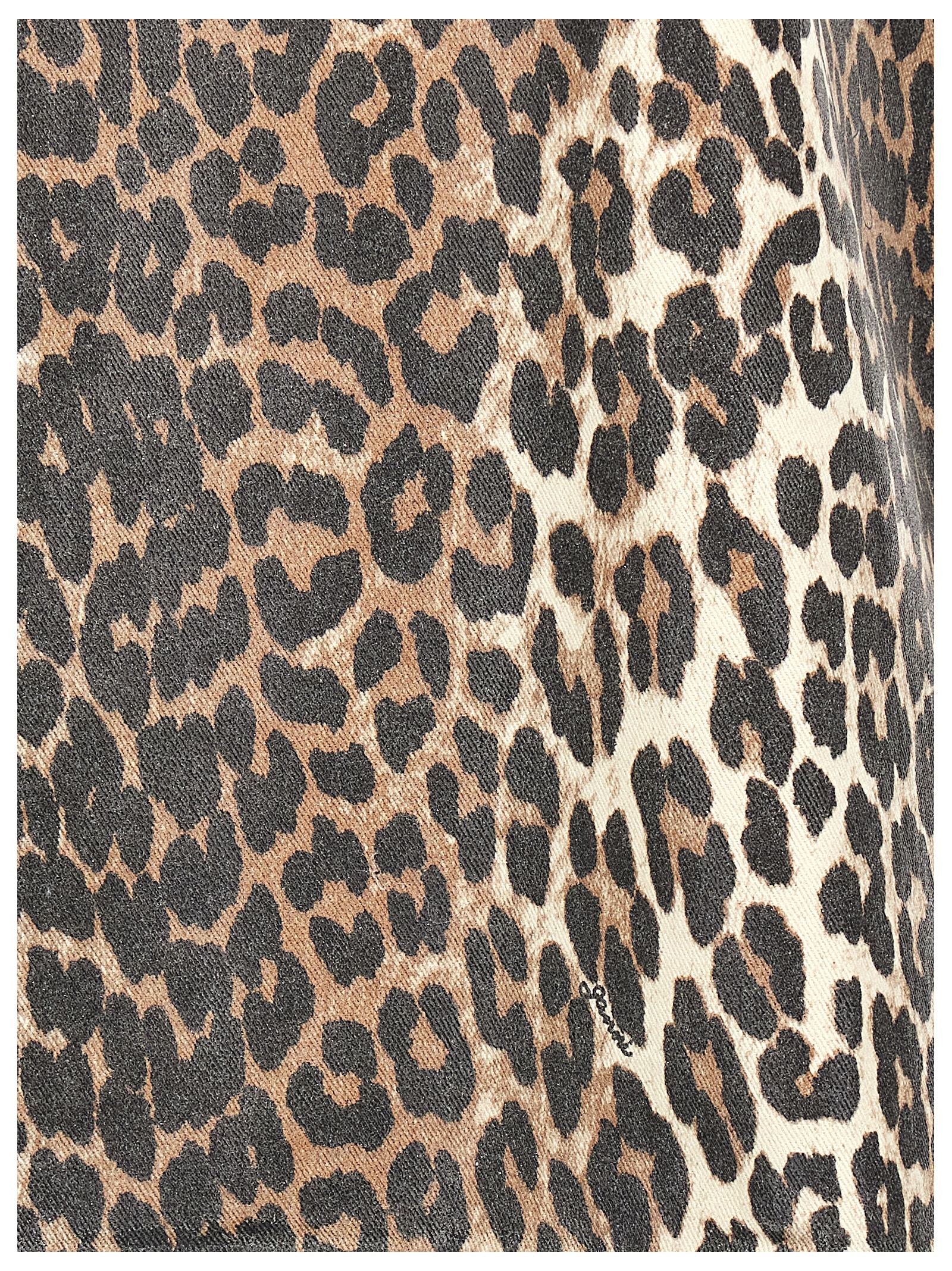 Dress by Ganni for women in stretch organic cotton denim multicolor, leopard-print & print features an sultry silhouette defined by a and , falling to an sultry short mini for a sultry look.
