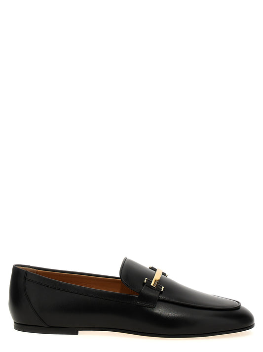 Flat Loafer Slip-On Shoes by Tod's for women in calfskin leather black features an dynamic silhouette from the Women's Calfskin Leather Flat Loafer Slip-On Shoes collection, defined by a dynamic and flat for a dynamic look.