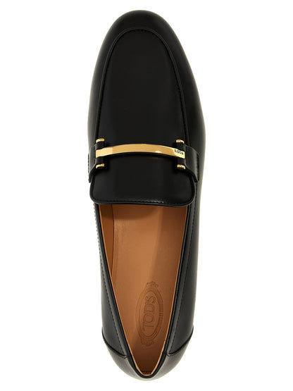 This Flat Loafer Slip-On Shoes by Tod's for women in calfskin leather black features an exquisite silhouette from the Women's Calfskin Leather Flat Loafer Slip-On Shoes collection, defined by a sophisticated flat and elegant .