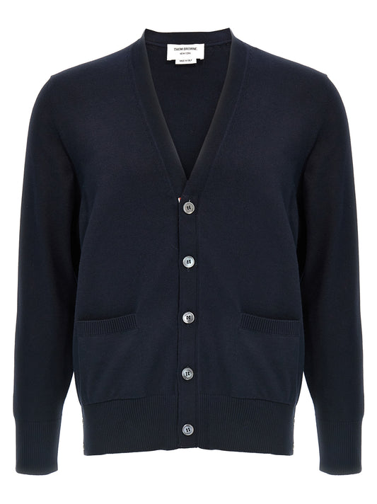 Cardigan by Thom Browne for men in cotton blue & signature features a dramatic silhouette, showcasing a sophisticated v-neck neckline and dramatic detail for a timeless, premium look.