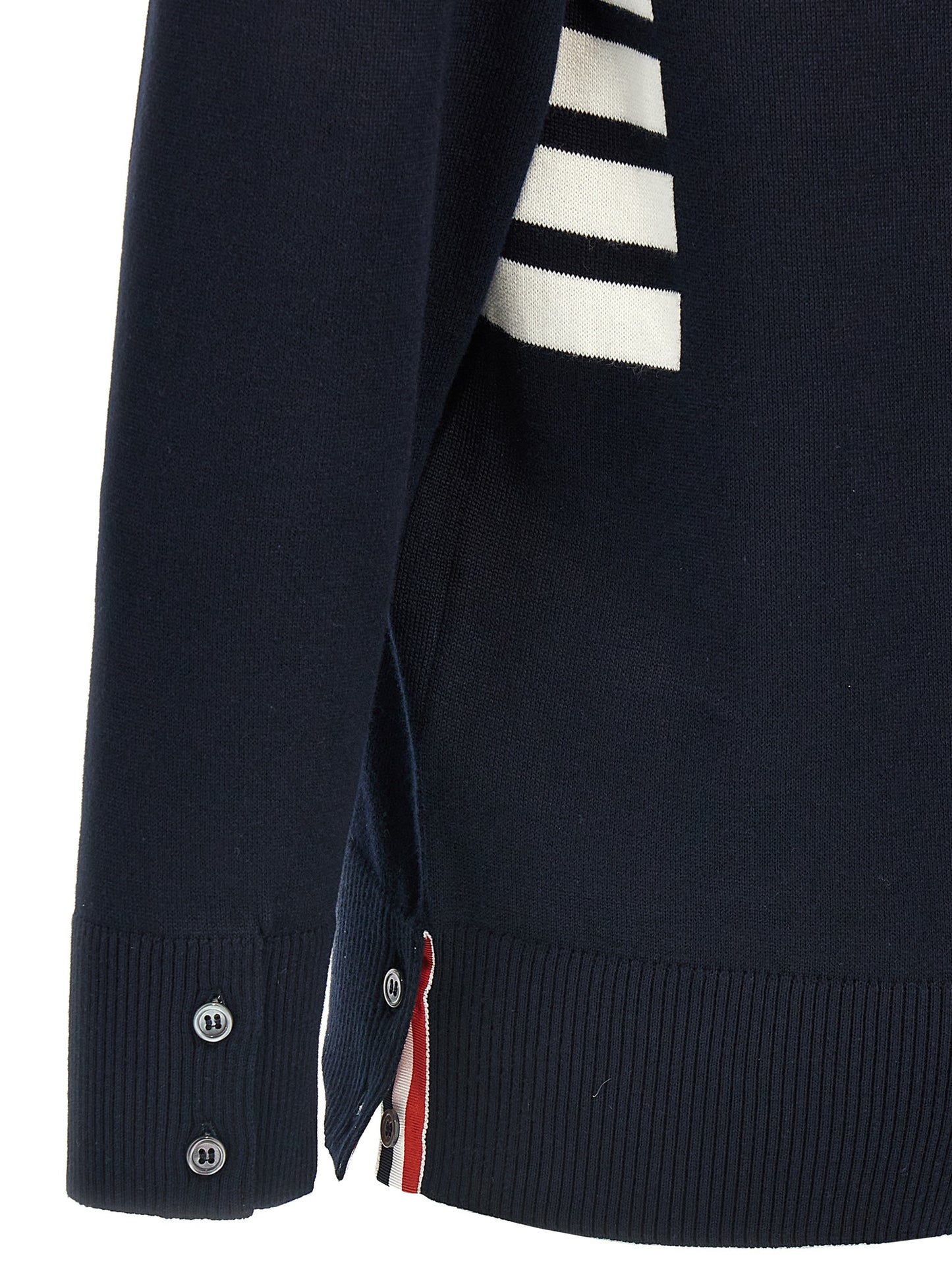 Cardigan by Thom Browne for men in cotton blue & signature features an impeccable silhouette, showcasing a sophisticated and detail for a truly impeccable finish.