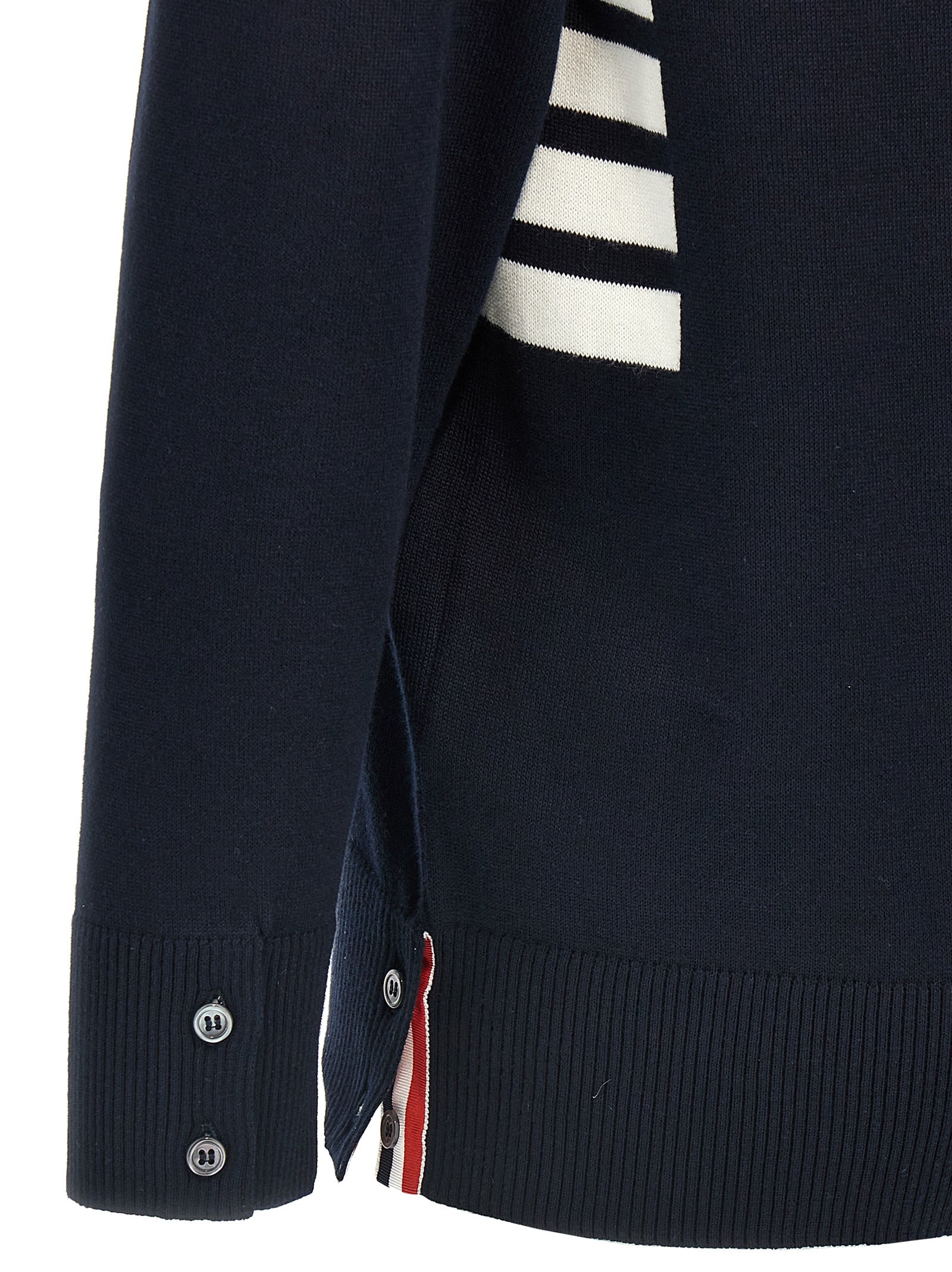 Cardigan by Thom Browne for men in cotton blue & signature features an impeccable silhouette, showcasing a sophisticated and detail for a truly impeccable finish.