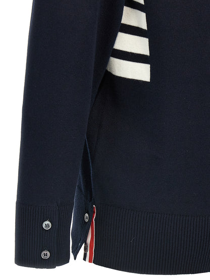 Cardigan by Thom Browne for men in cotton blue & signature features an impeccable silhouette, showcasing a sophisticated and detail for a truly impeccable finish.