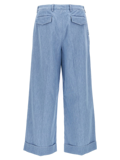Jeans by Valentino Garavani for men in denim cotton blue presents a tailored silhouette, showcasing a tailored wide and long cut with a refined high rise for a truly tailored aesthetic.