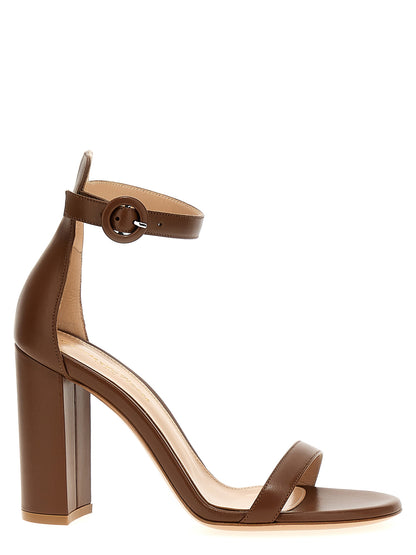 Stiletto Ankle Strap Sandals by Gianvito Rossi for women in goatskin leather brown presents a sculptural silhouette, showcasing the Women's Goatskin Leather Stiletto Ankle Strap Sandals design with a sculptural stiletto and for a premium look.