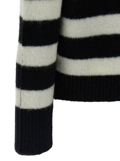 Cardigan by Marc Jacobs for women in alpaca wool bicolour, black, white & striped features a dramatic silhouette, showcasing a sophisticated and dramatic detail for a timeless, premium look.