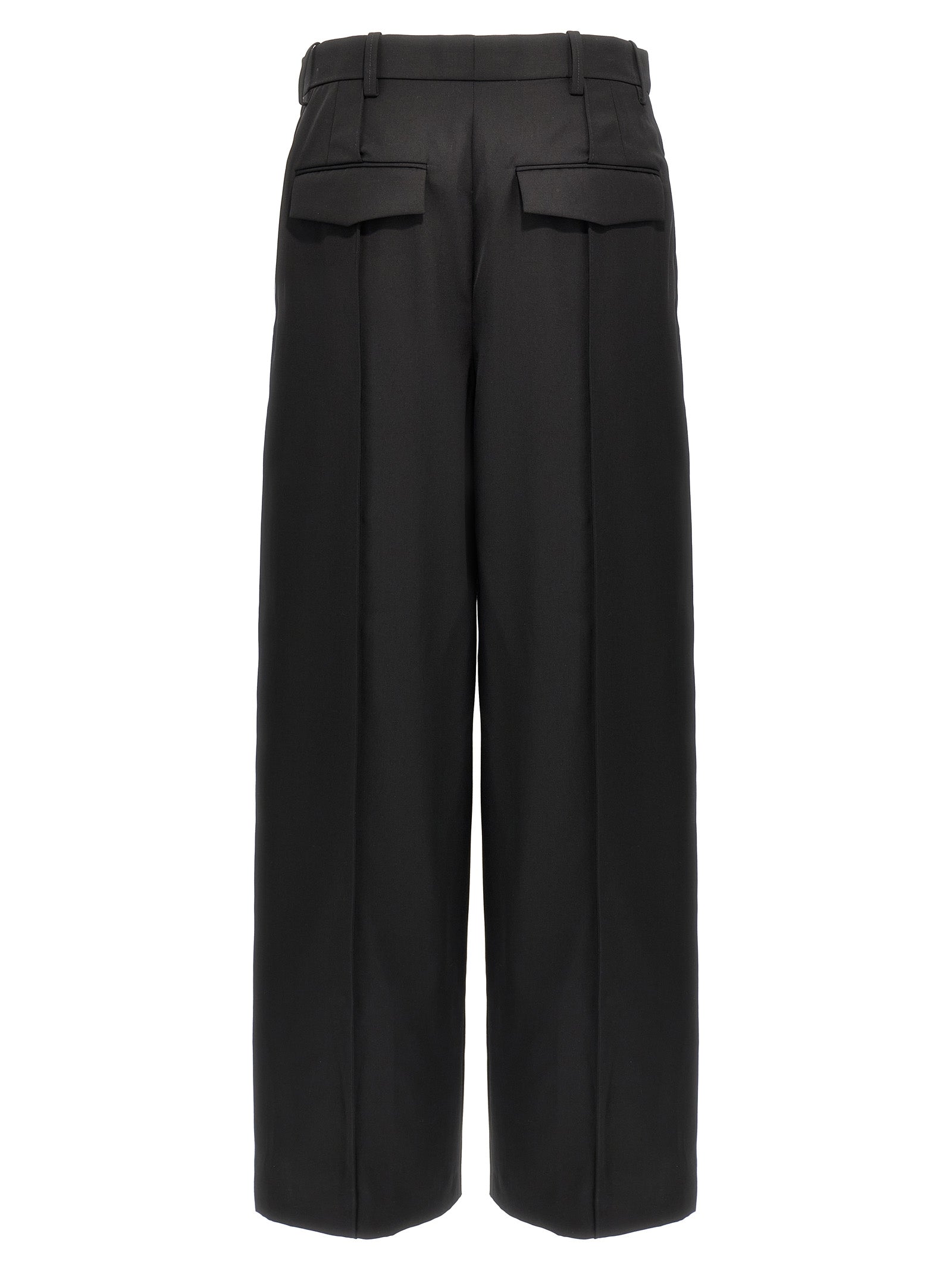 Trousers by Wardrobe.Nyc for women in wool black presents a smart silhouette, meticulously detailed with a smart straight, a smart long, and a smart high rise.
