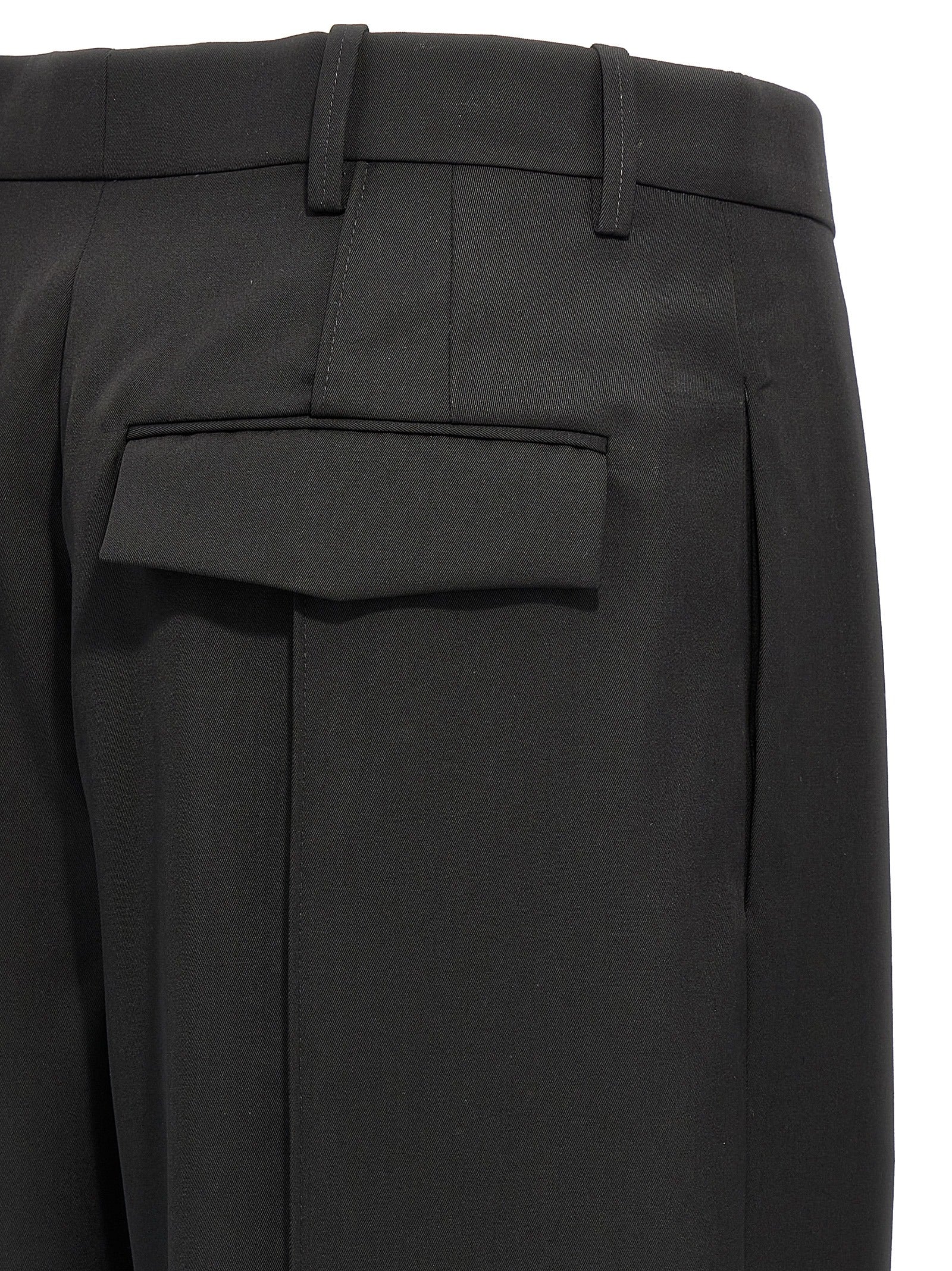 Trousers by Wardrobe.Nyc for women in wool black features a sculptural silhouette, showcasing a sculptural straight and long with a sophisticated high rise for a sculptural finish.