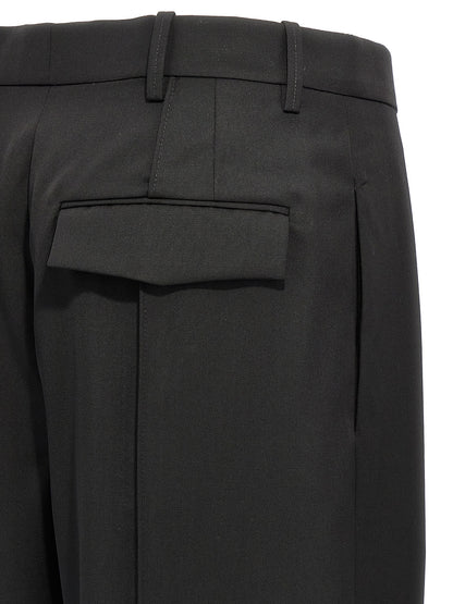 Trousers by Wardrobe.Nyc for women in wool black features a sculptural silhouette, showcasing a sculptural straight and long with a sophisticated high rise for a sculptural finish.