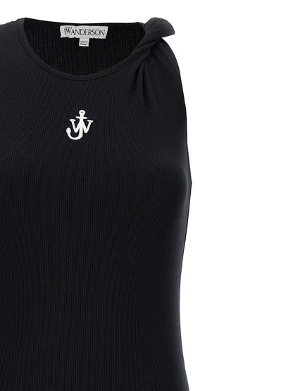 Dress by J.W.Anderson for women in cotton black presents a sinuous silhouette, showcasing a sophisticated round neckline and detailed with a sinuous midi for a refined finish.