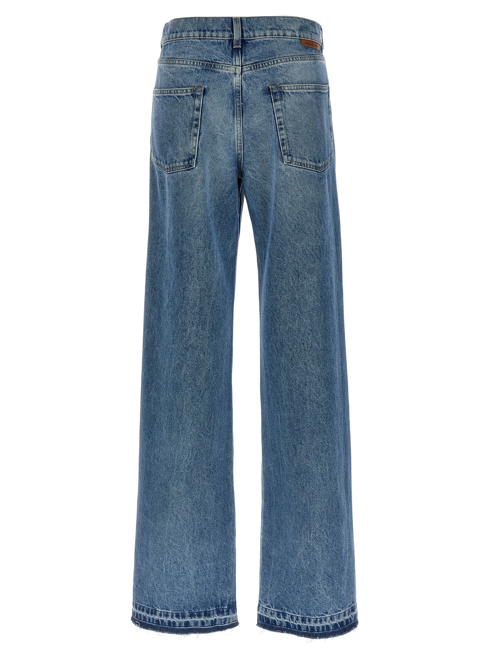 Jeans by Stella McCartney for women in denim cotton light-blue presents a refined pantology silhouette, artfully defined by a refined pantology straight-leg & wide, long, and a sophisticated high rise.