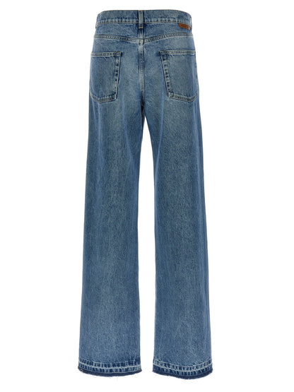 Jeans by Stella McCartney for women in denim cotton light-blue presents a refined pantology silhouette, artfully defined by a refined pantology straight-leg & wide, long, and a sophisticated high rise.