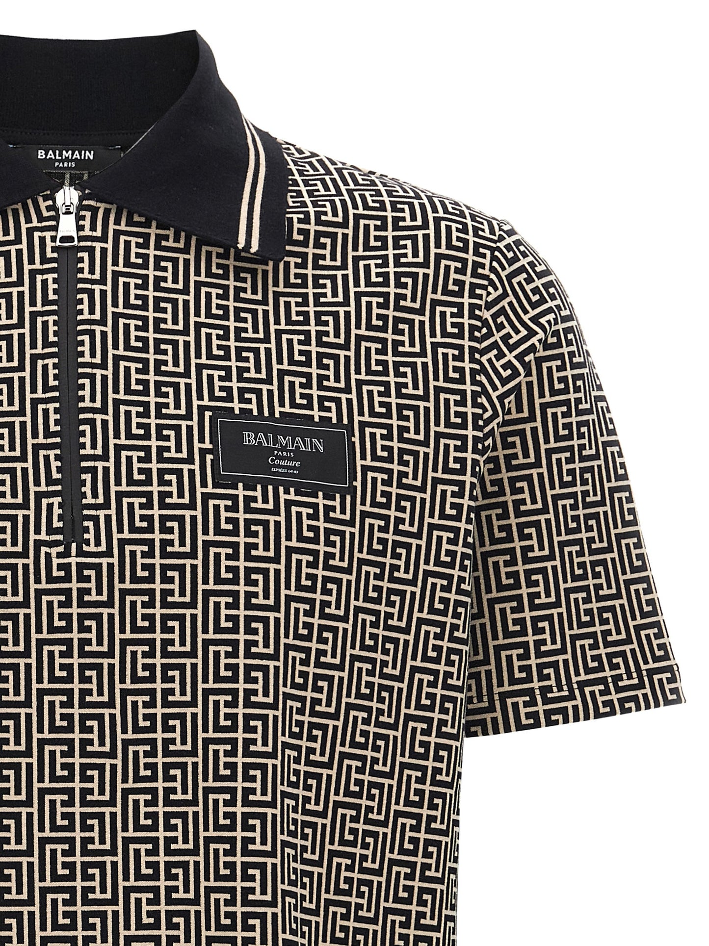 This Polo Shirt by Balmain for men in stretch organic cotton bicolour, black, white, patterned, jacquard & monogram presents a flawless silhouette, showcasing flawless detailing and a refined for a truly flawless aesthetic.
