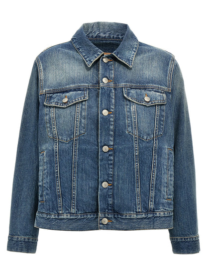 Trucker Jacket by MM6 Maison Margiela for women in denim cotton blue features an contemporary silhouette, showcasing a sophisticated and contemporary pockets for a truly refined look.
