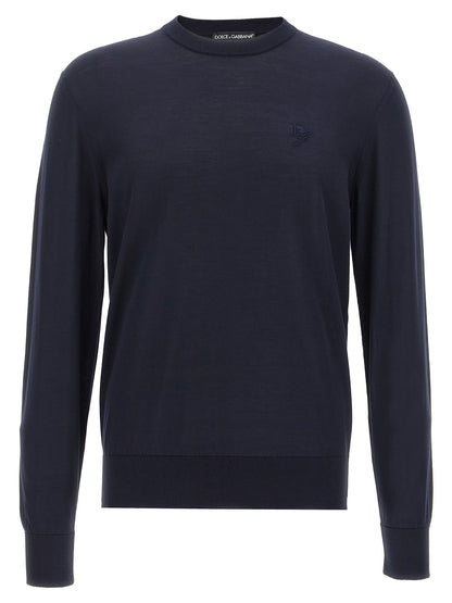 Cardigan by Dolce & Gabbana for men in silk blue features a nuanced silhouette with a refined crew neckline and nuanced detailing for a sophisticated look.