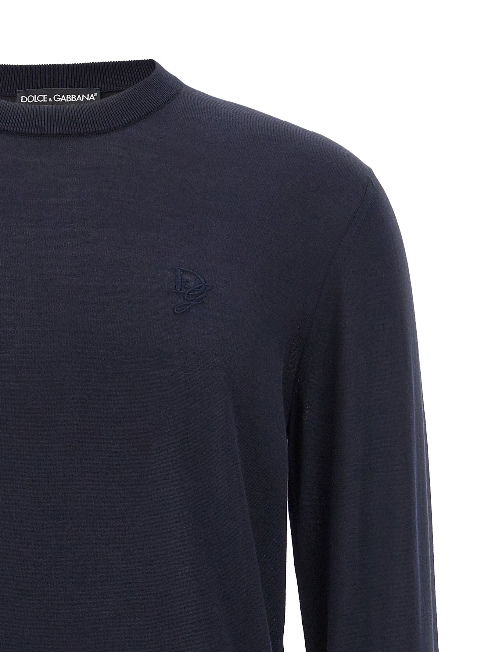Cardigan by Dolce & Gabbana for men in silk blue showcases a captivating silhouette, artfully detailed with a captivating and crew neckline for a truly sophisticated captivating look.