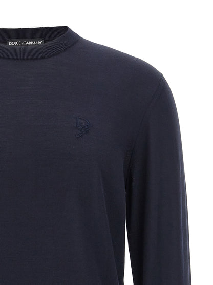 Cardigan by Dolce & Gabbana for men in silk blue showcases a captivating silhouette, artfully detailed with a captivating and crew neckline for a truly sophisticated captivating look.