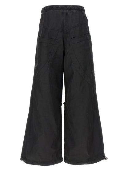 Casual Pants by The Attico for women in nylon & polyester black features an sophisticated and oversized with a precise long, creating a sophisticated and sophisticated silhouette.