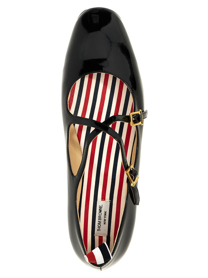 Ballet Flat Shoes by Thom Browne for women in patent lamb leather black, signature & striped features an captivating silhouette, showcasing the captivating style of the Women's Patent Lamb Leather Ballet Flat Shoes with its distinct and refined .