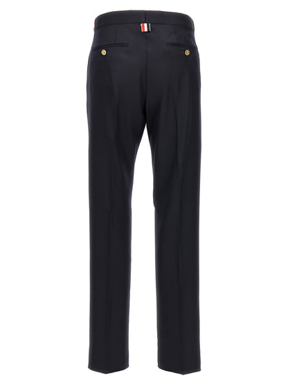 Trousers by Thom Browne for men in wool twill blue features an sartorial silhouette, showcasing a precise straight-leg and long with a sartorial low rise for a refined look.
