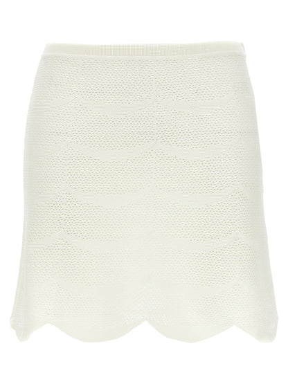 Skirt by Tom Ford for women in cotton & silk white showcases a dramatic silhouette, artfully capturing the essence of the Crochet Women's Cotton & Silk Mini Long Skirt in a dramatic mini long cut for a refined look.