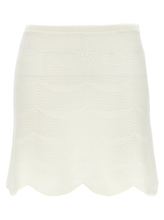 Skirt by Tom Ford for women in cotton & silk white showcases a dramatic silhouette, artfully capturing the essence of the Crochet Women's Cotton & Silk Mini Long Skirt in a dramatic mini long cut for a refined look.