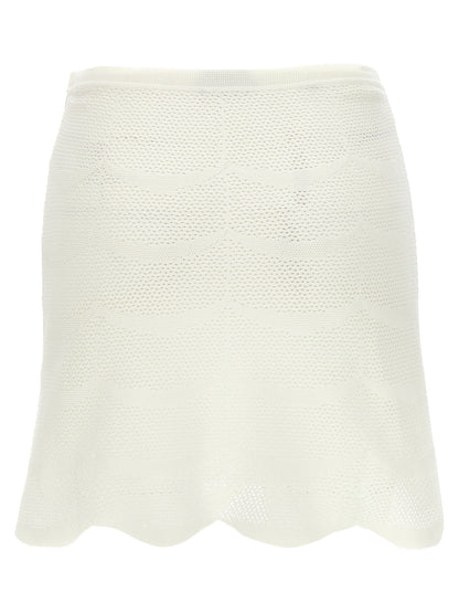Skirt by Tom Ford for women in cotton & silk white features a captivating silhouette, showcasing the captivating Crochet Women's Cotton & Silk Mini Long Skirt design with a sophisticated mini long for a captivating look.