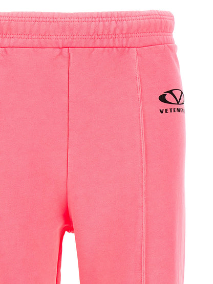 Joggers by Vetements for women in cotton polyester multicolor, pink & print features a refined silhouette with a refined , defined by a and a refined long for a refined finish.