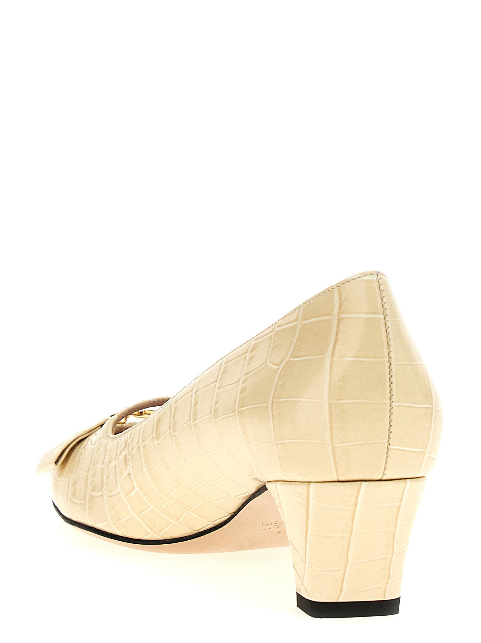 Mid-Heel Pumps Heels by Valentino Garavani for women in crocodile calfskin leather white, patterned, floral & signature features an effortlessly chic silhouette from the V Logo Women's Crocodile Calfskin Leather Mid-Heel Pumps Heels collection, showcasing a mid-heel and effortlessly chic for a effortlessly chic look.