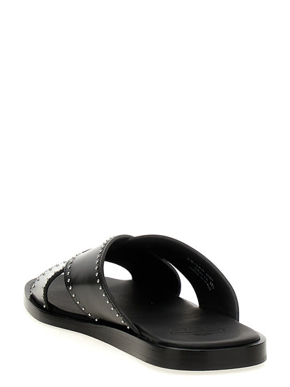 Sliders Sandals Flat Shoes by Church's for women in bos taurus calf leather black features an captivating silhouette, showcasing the captivating style of the Women's Bos Taurus Calf Leather Sliders Sandals Flat Shoes with its distinct and refined .