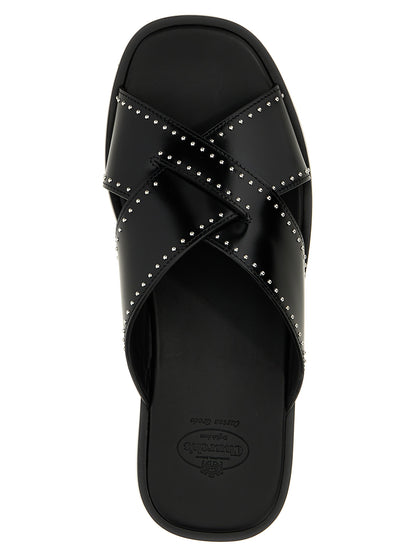 Sliders Sandals Flat Shoes by Church's for women in bos taurus calf leather black features an statuesque silhouette from the Women's Bos Taurus Calf Leather Sliders Sandals Flat Shoes collection, showcasing a and a statuesque for a statuesque look.