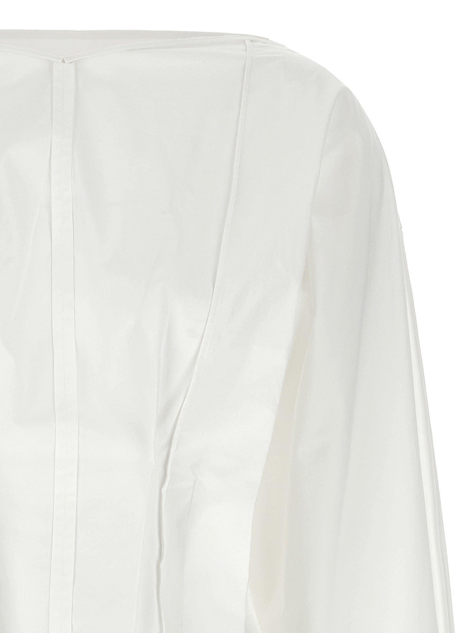 Blouse by Khaite for women in cotton white, featuring a nuanced and nuanced v-neck neckline for a sophisticated finish.