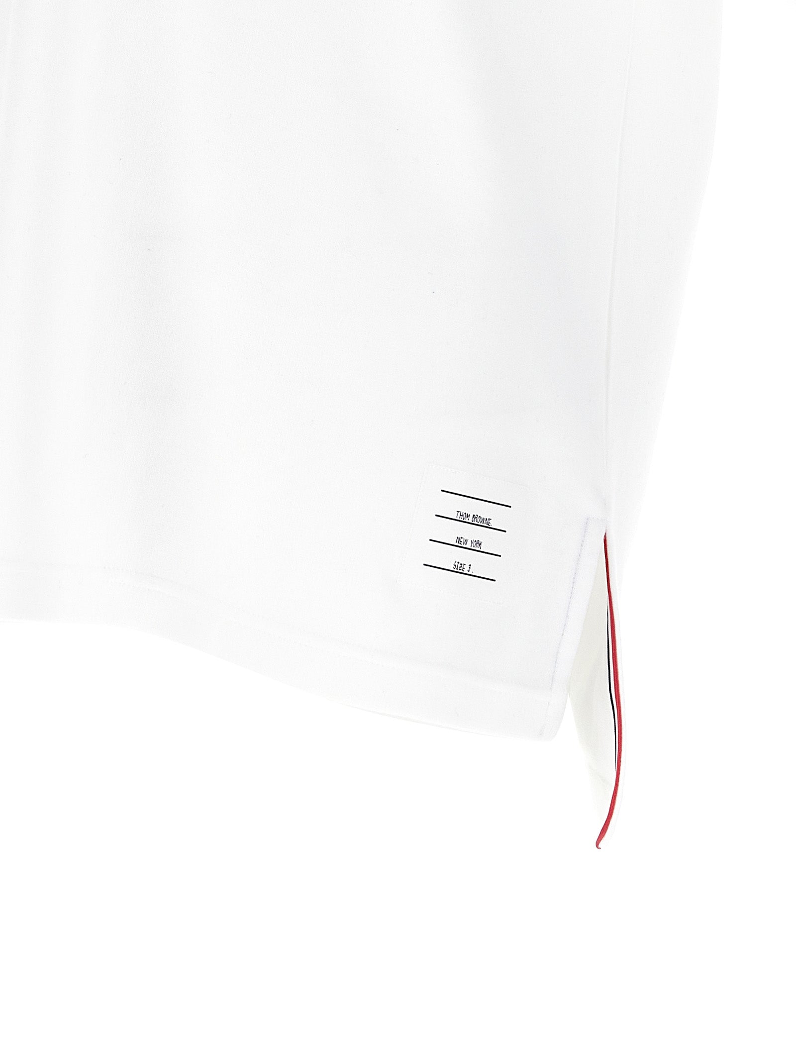 Polo Shirt by Thom Browne for men in cotton white presents a distinguished silhouette, showcasing a sophisticated and distinguished for a truly distinguished finish.