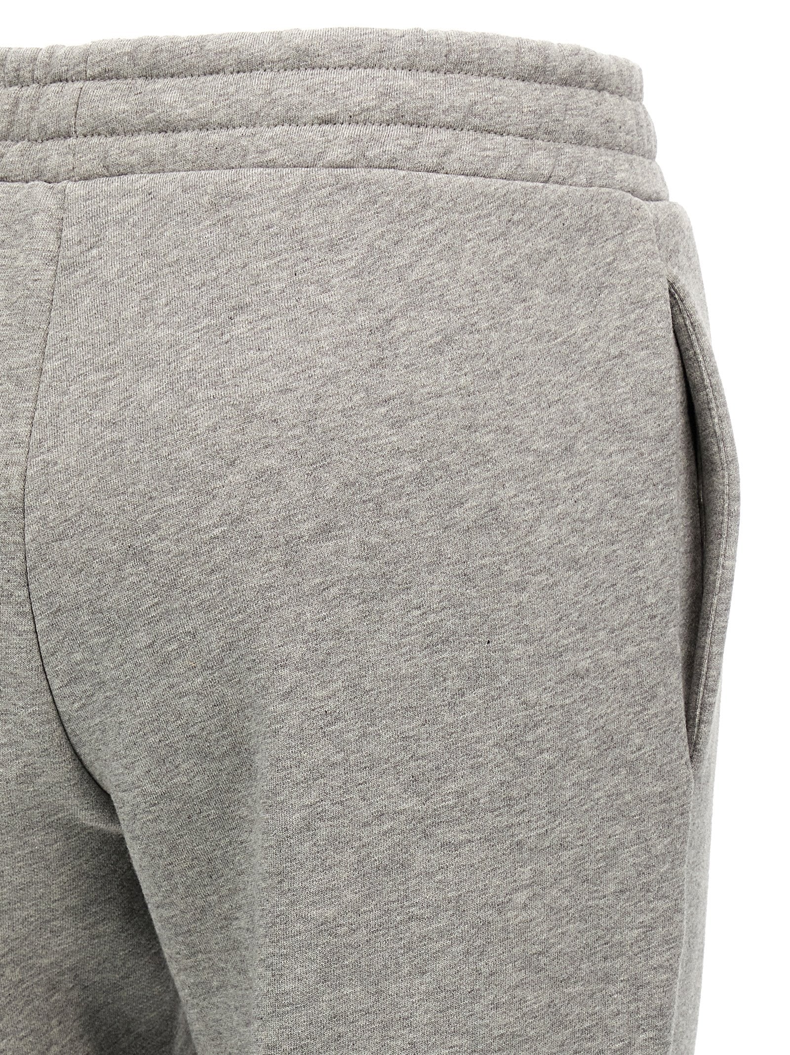 Joggers by The Attico for women in cotton gray features an sartorial straight-leg and long with a cut for a sartorial finish.