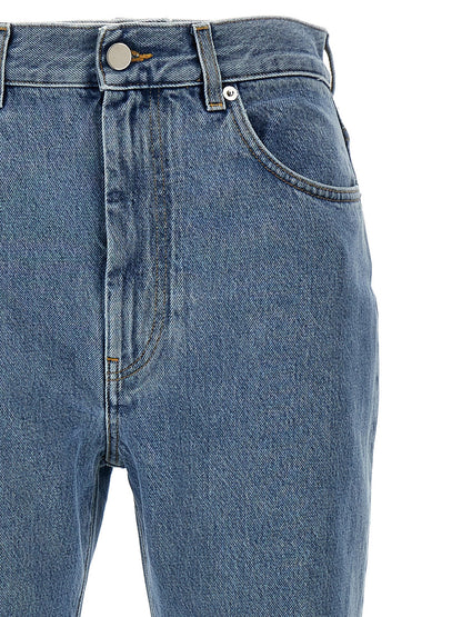 Jeans by Loulou De Saison for women in organic denim cotton & leather light-blue features an refined tailoring silhouette, showcasing a premium straight-leg with a high rise and long cut for a refined tailoring look.