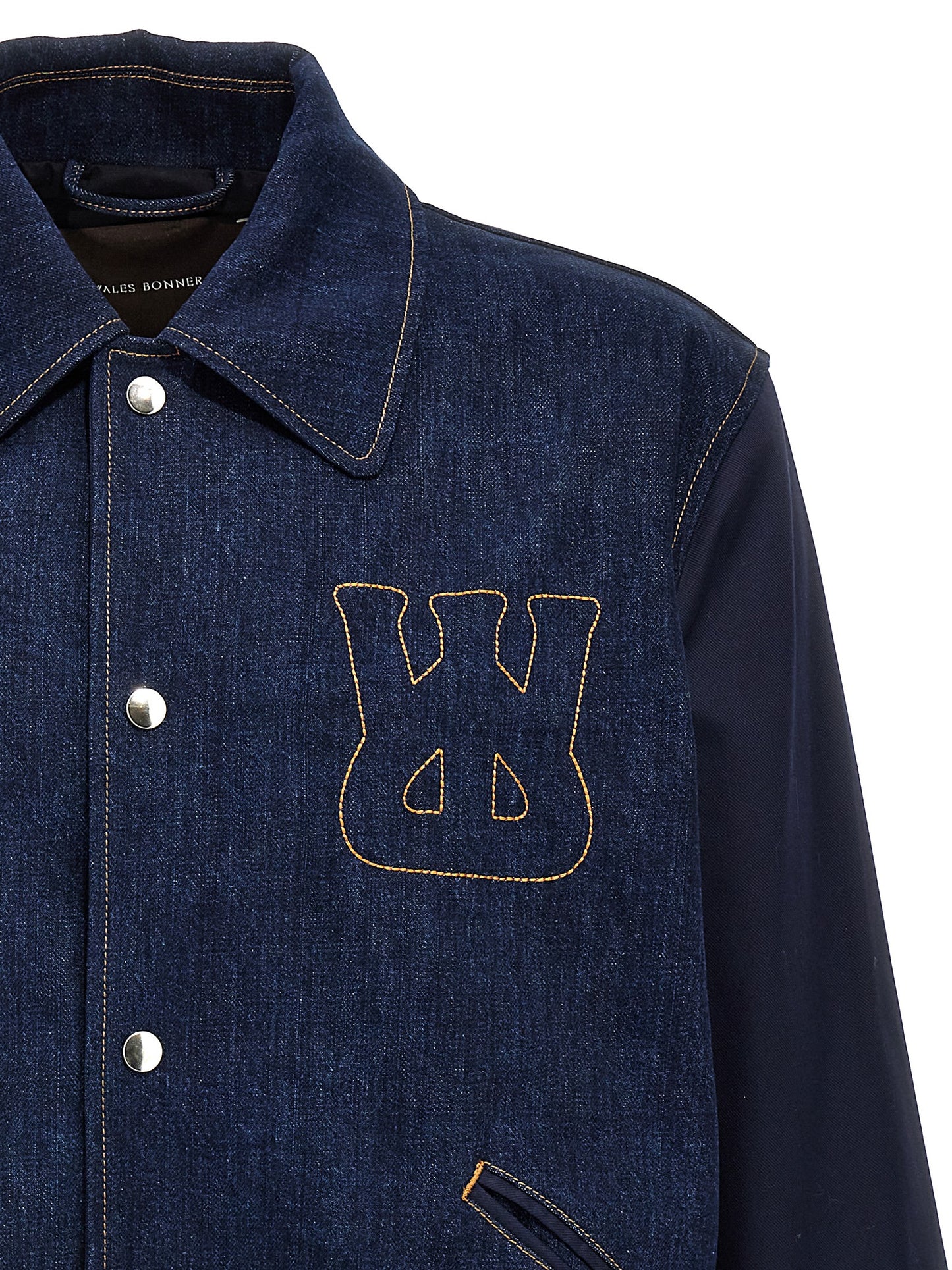 Trucker Jacket by WALES BONNER for men in denim cotton blue showcases a bohemian silhouette, artfully detailed with a bohemian and signature for a truly bohemian finish.